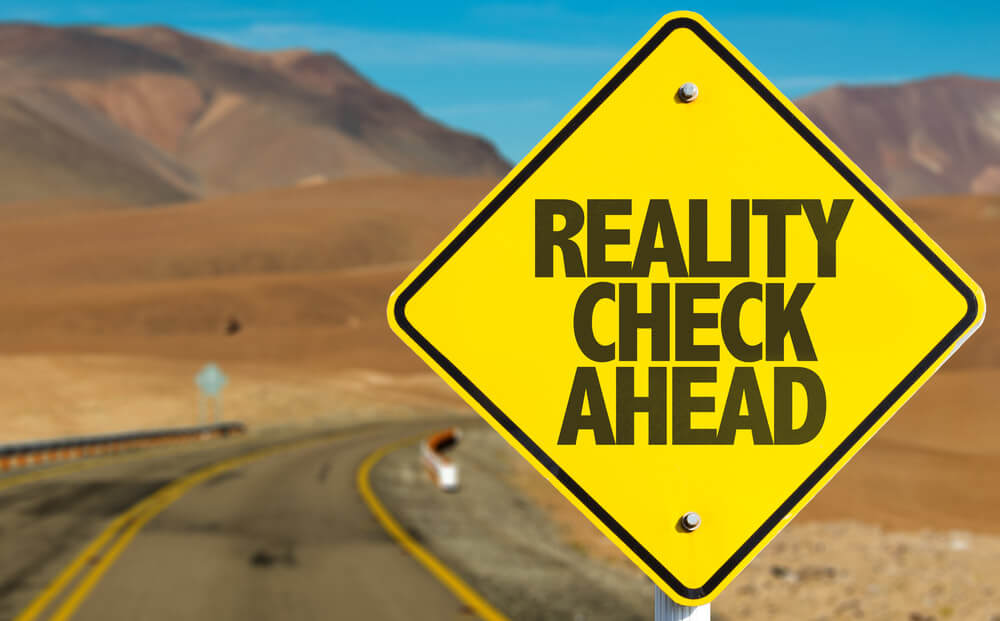 Reality Check Ahead Sign (8 Truths Of Content Marketing Header Image)